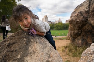 Elise Climbing Rocks in Central Park NYC
